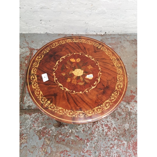 67 - An Italian inlaid walnut effect circular music table - approx. 50cm high x 43cm diameter