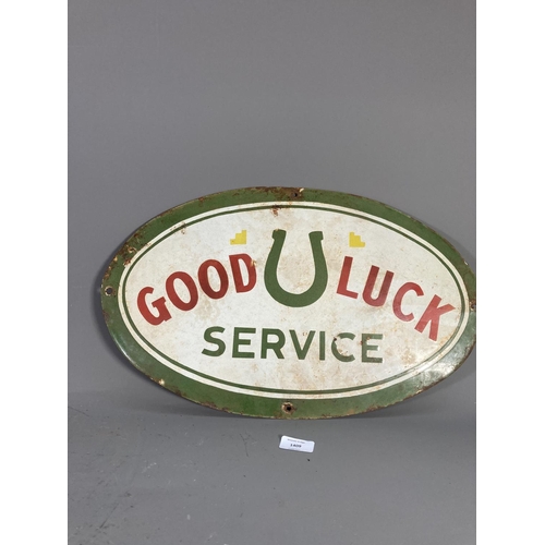 1409 - A Good Luck Service enamel sign - approx. 50cm wide x 30cm high