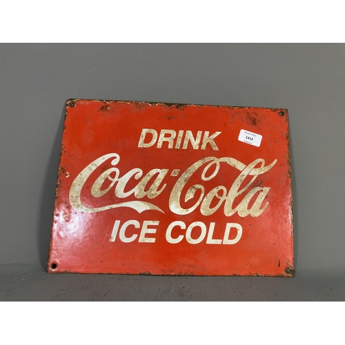 1412 - A Coca-Cola enamel sign - approx. 38cm wide x 28cm high