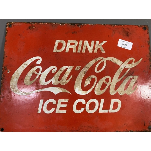 1412 - A Coca-Cola enamel sign - approx. 38cm wide x 28cm high