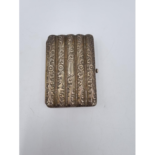 1012 - A white metal cigarette box with acanthus leaf design - approx. 8cm x 5.5cm and gross weight 96 gram... 