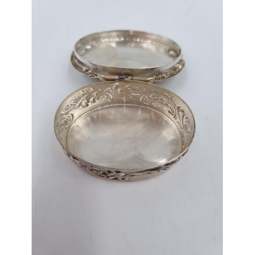 1018 - Two 925 silver fairy design pill/trinket boxes - approx. gross weight 55 grams