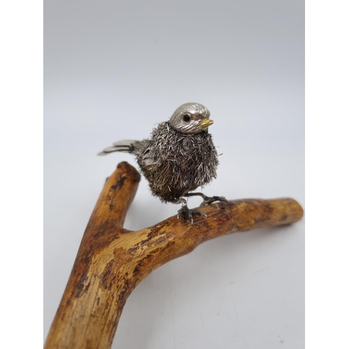 1024 - A 925 silver bird ornament on wooden branch - approx. 15cm long x 7.5 high