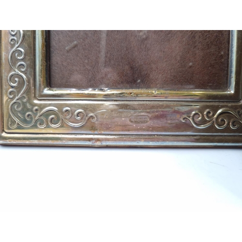 1058 - A pair of Francis Howard Ltd hallmarked Sheffield silver photo frames - approx. 18cm high x 14cm wid... 