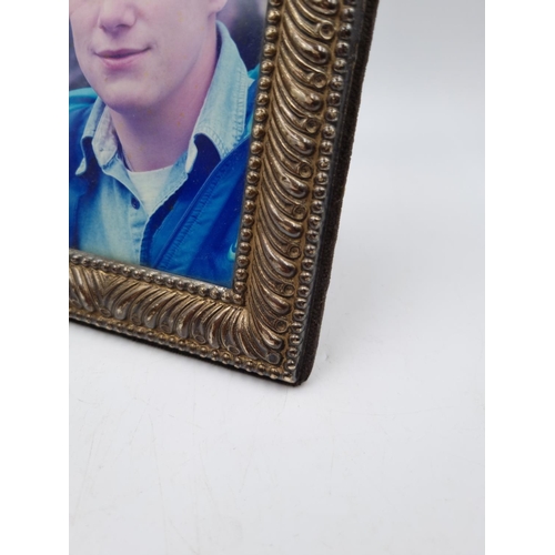 1059 - A Francis Howard Ltd hallmarked Sheffield silver photo frame, dated 1988 - approx. 20cm high x 14cm ... 