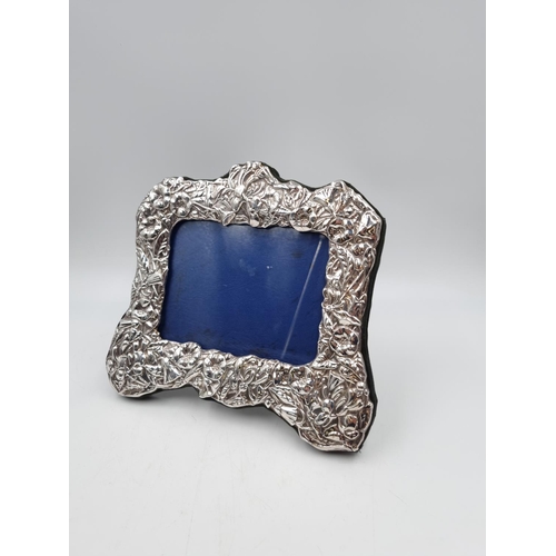 1060 - A hallmarked Birmingham silver photo frame by MMH, dated 2000 - approx. 20.5cm high x 22cm wide