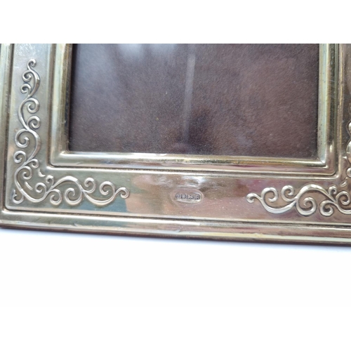 1061 - A pair of Francis Howard Ltd hallmarked Sheffield silver photo frames - approx. 18cm high x 14cm wid... 