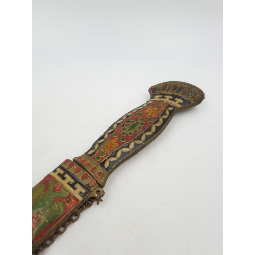 1068 - A cloisonné paper knife and scabbard depicting double headed eagle and stylised peacock, possibly Ru... 