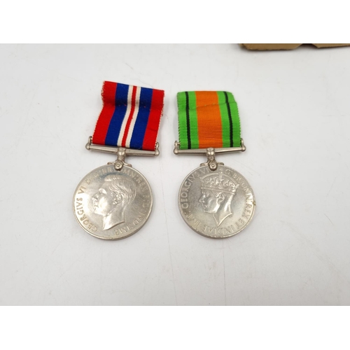 1072 - Two boxed WWII medal groups labelled Mrs A. E. Emmett and J. L. Emmett, 'Fern Bank' Crouch Lane, Bug... 