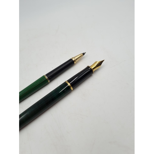 1077 - Two vintage Parker malachite lacquer cased pens, one ball point and one fountain