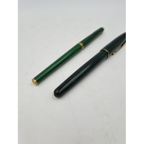 1077 - Two vintage Parker malachite lacquer cased pens, one ball point and one fountain