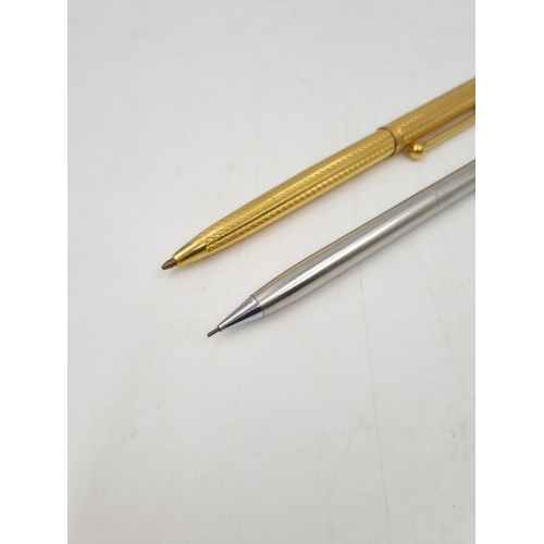 1081 - Four Waterman writing instruments, one propelling pencil, two fountain pens with 18ct gold nibs and ... 