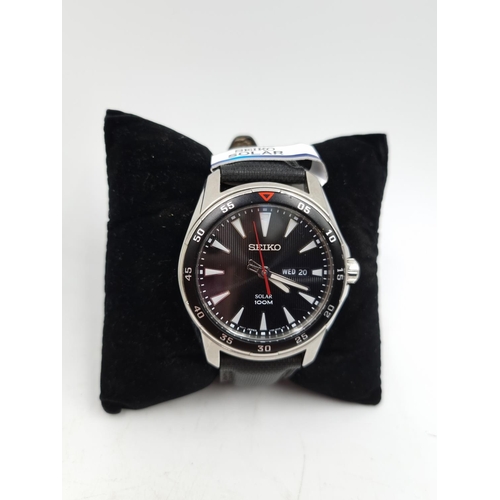 1086 - A boxed Seiko Solar ref. SNE393P2 quartz men's 43mm wristwatch with original tags, instruction manua... 