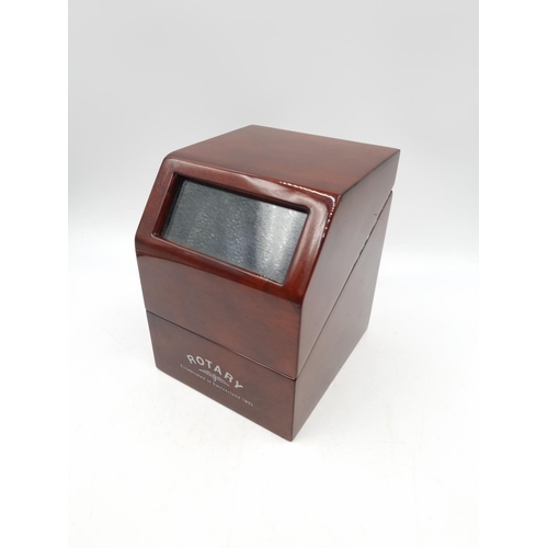 1099A - A boxed Rotary mahogany two speed uni directional watch winder