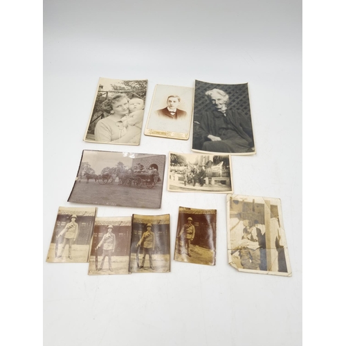 1108 - A large collection of antique and vintage photographs to include portrait, military etc.