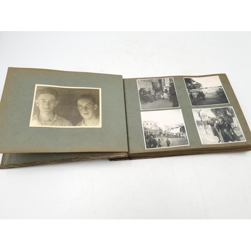 1108 - A large collection of antique and vintage photographs to include portrait, military etc.