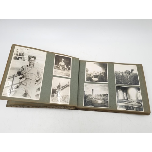 1108 - A large collection of antique and vintage photographs to include portrait, military etc.