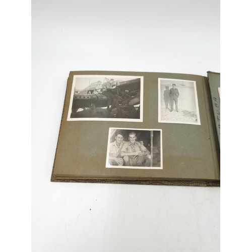 1108 - A large collection of antique and vintage photographs to include portrait, military etc.