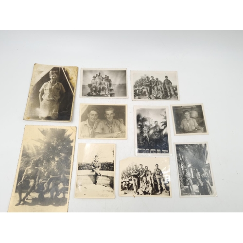 1108 - A large collection of antique and vintage photographs to include portrait, military etc.