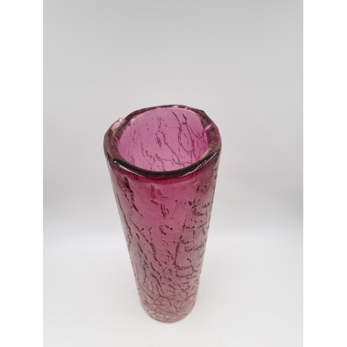 1123 - A 20th century cranberry studio glass vase - approx. 34.5cm high