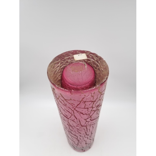 1123 - A 20th century cranberry studio glass vase - approx. 34.5cm high