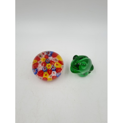 1124 - Eleven assorted art glass paperweights to include millefiori, frog etc.