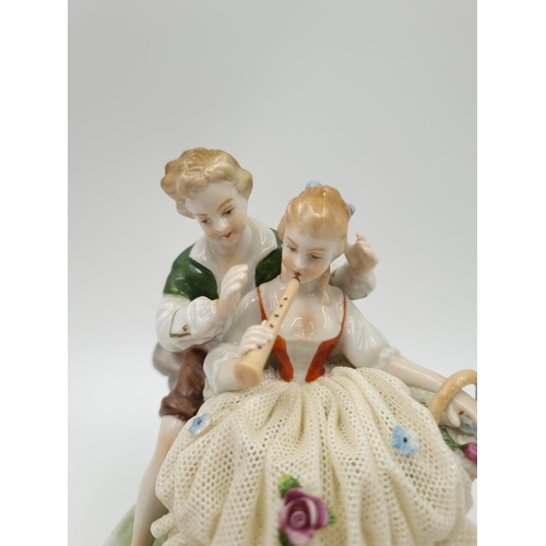 1147 - An Unterweissbach porcelain lace figurine - approx. 13cm high