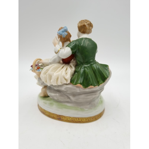 1147 - An Unterweissbach porcelain lace figurine - approx. 13cm high