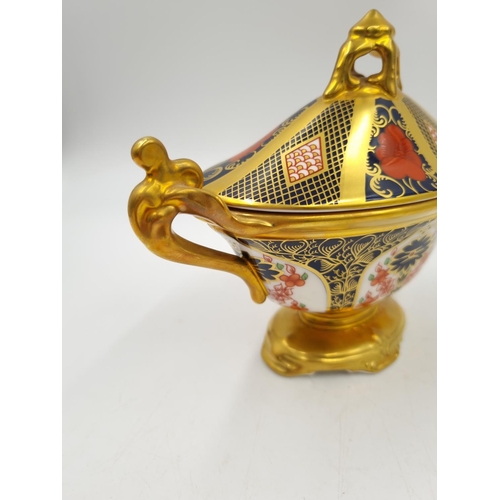 1158 - A Royal Crown Derby Old Imari twin handled oval pedestal bowl with lid - approx. 14cm high x 18cm wi... 