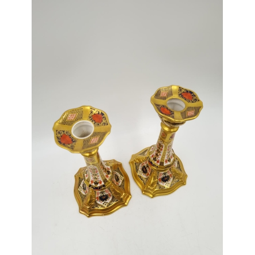 1159 - A pair of Royal Crown Derby Old Imari candlesticks - approx. 18cm high