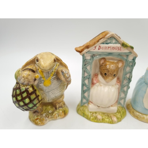 1171 - Four Royal Albert Beatrix Potter figurines comprising Mrs Rabbit Cooking, Mr Alderman Ptolemy, Diggo... 