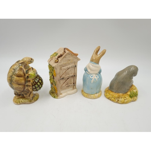 1171 - Four Royal Albert Beatrix Potter figurines comprising Mrs Rabbit Cooking, Mr Alderman Ptolemy, Diggo... 