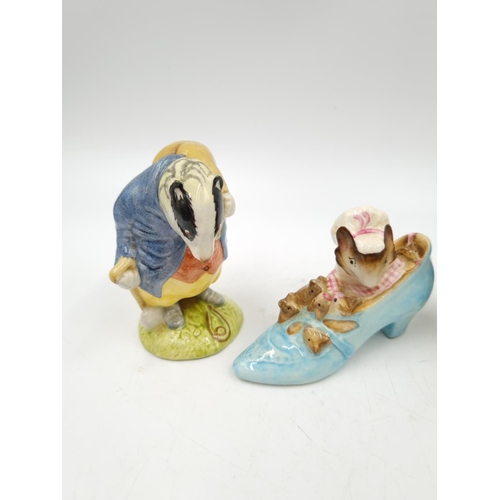 1173 - Four Beswick Beatrix Potter figurines comprising Mr Benjamin Bunny, The Old Woman who lived in a Sho... 