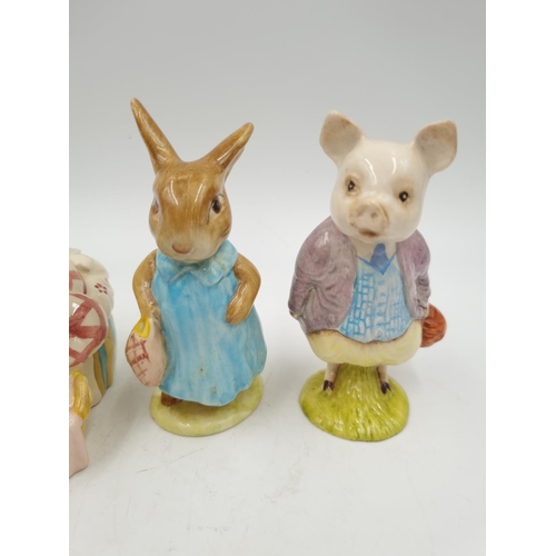 1176 - Four Beswick Beatrix Potter figurines comprising Mrs Flopsy Bunny, Jeremy Fisher, Pigling Bland and ... 