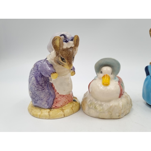 1179 - Four Royal Albert Beatrix Potter figurines comprising Lady Mouse Made a Curtsy, Ribby and the patty ... 