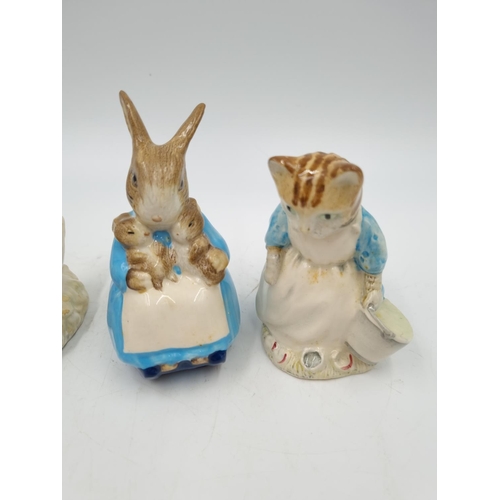 1179 - Four Royal Albert Beatrix Potter figurines comprising Lady Mouse Made a Curtsy, Ribby and the patty ... 