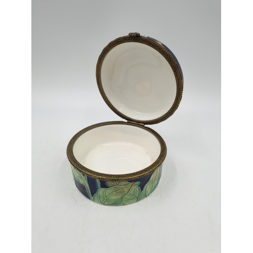 1183 - Four ceramic trinket boxes, three Benaya tubelined and one Agiftcorp