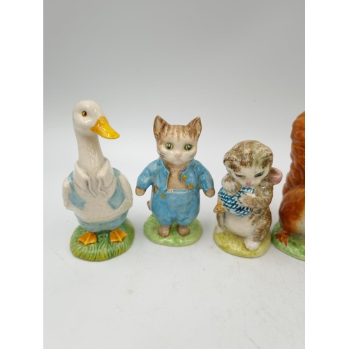 1187 - Eight ceramic animal figurines, four Beswick Beatrix Potter, three Royal Albert Beatrix Potter and o... 