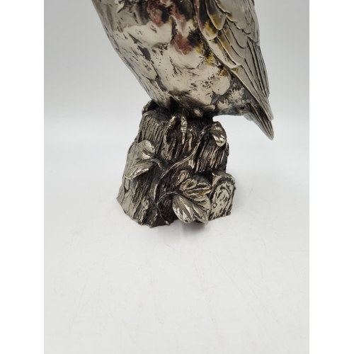 1197 - A Michael Simpson nickel plated resin owl figurine with impressed maker's mark to reverse - approx. ... 