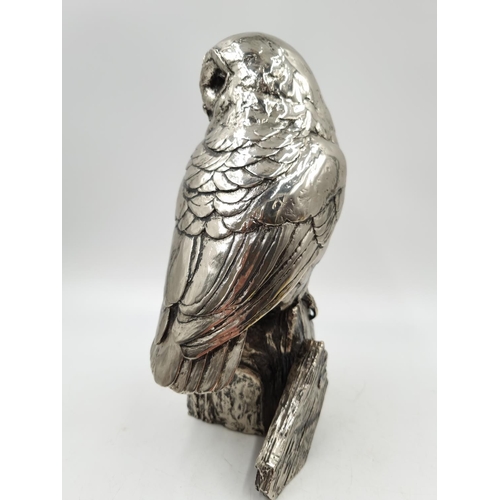 1197 - A Michael Simpson nickel plated resin owl figurine with impressed maker's mark to reverse - approx. ... 