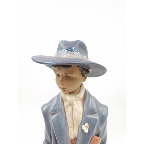 1202 - Two Lladro figurines comprising Ready to Go, no. 2388 - approx. 27cm high and Time to Go, no. 2389 -... 