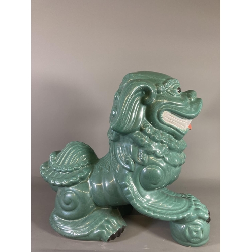 1378 - An Oriental ceramic foo dog figurine - approx. 44cm high x 52cm long