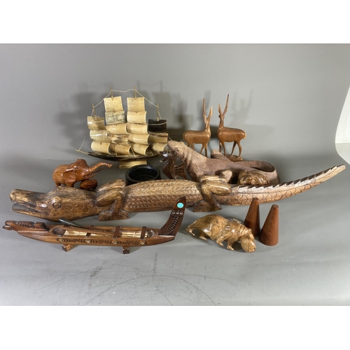 1379 - A collection of assorted carved treen animal figures and horn model ship