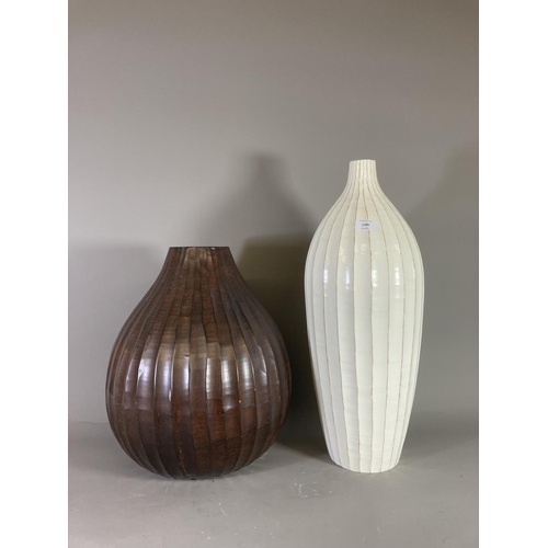 1380 - Two contemporary carved hardwood vases - largest approx. 57cm high