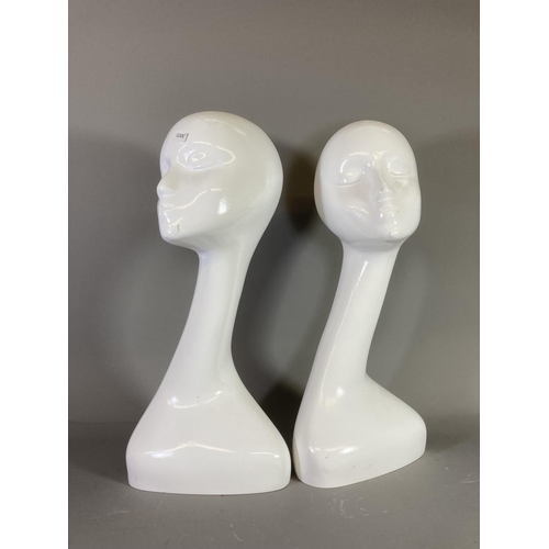 1381 - A pair of contemporary white plastic female mannequin busts - approx. 51cm high