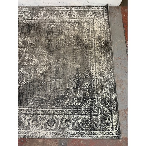 250 - A modern silver and white rug - approx. 294cm x 200cm