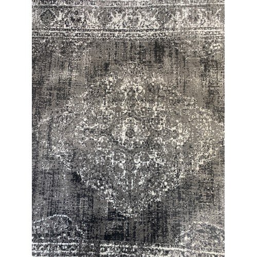 250 - A modern silver and white rug - approx. 294cm x 200cm