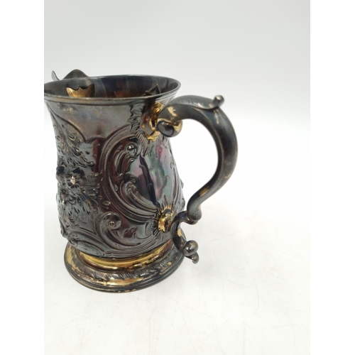 1001 - A George III hallmarked London silver jug by Fuller White, dated 1760 - approx. 10cm high and gross ... 