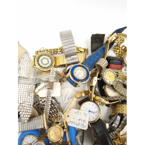 1100 - A large collection of assorted wristwatches and jewellery to include vintage Ingersoll and Timex wri... 