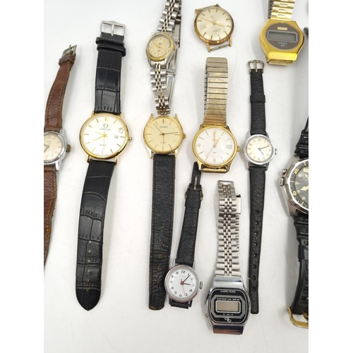 1101 - A large collection of assorted vintage wristwatches to include Casio analogue/digital quartz, Amido ... 